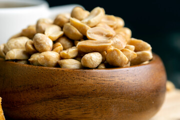 Peeled and roasted peanuts on the table