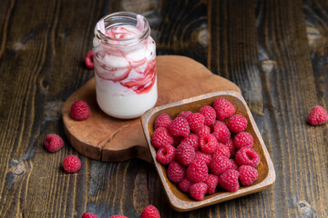 Fresh delicious milk yogurt with raspberry flavor
