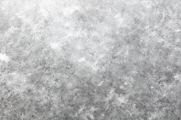 White snowflakes in winter as a background.