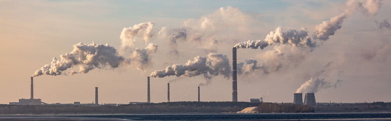 Smoke from chimneys at the plant pollutes nature.