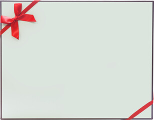 Gift box with red ribbon photographed from the front
