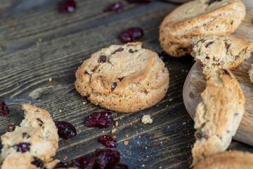 delicious dried cookies made of high-quality flour with dried red cranberries on the table