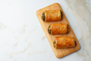 Banquet table with variety of stuffed pies pastry