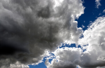 Blue sky with light clouds in windy weather