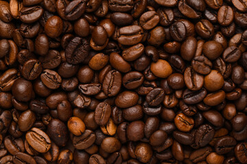 Closeup view of roasted coffee beans as background