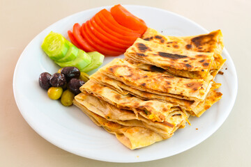 Turkish karisik atom  tost ( kasarli bazlama tost) . Sucuklu, Kasarli, kavurmali karisik tost. Flat baked bread toasted