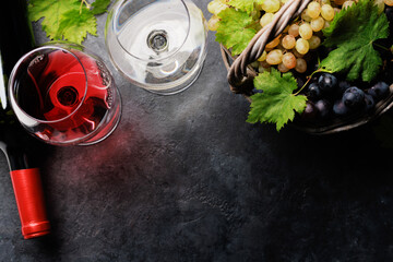 Wine glasses, bottles and grapes