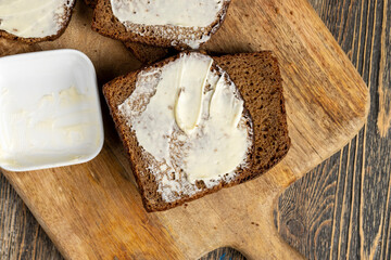 Black rye bread with butter