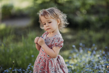 little girl with a flower