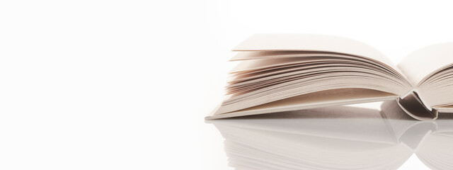 Open book on white background