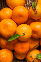 Heap of fresh ripe tangerines, closeup