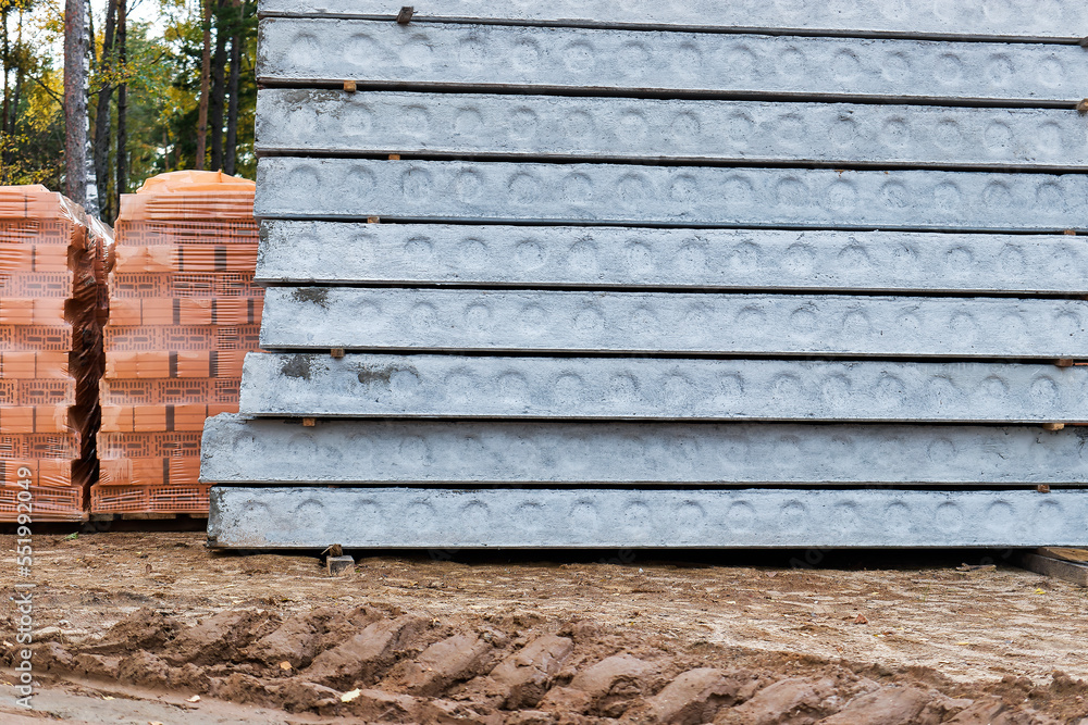 Poster reinforced concrete floor slabs are stored at the construction site. close-up. reinforced concrete b