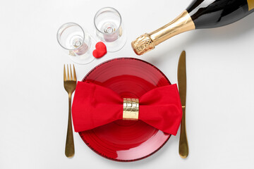 Table setting for Valentine's Day with heart on white background