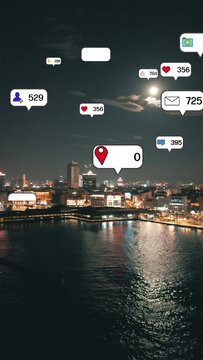 Social media icons fly over city downtown showing people reciprocity connection through social network application platform . Concept for online community and social media marketing strategy . High
