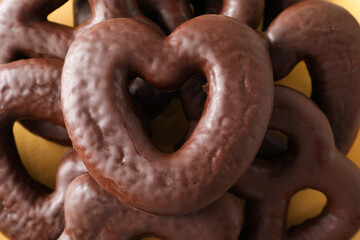 Concept of tasty bakery, gingerbread cookies in chocolate, close up