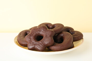 Concept of tasty bakery, gingerbread cookies in chocolate, close up