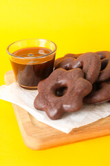 Concept of tasty bakery, gingerbread cookies in chocolate, close up