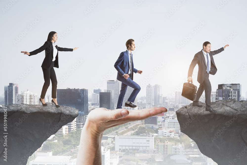 Poster Abstract image of team helping each other walk through difficulty on abstract city background with cliff gap. Teamwork, help, success and union concept.