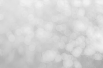 Abstract white bokeh with soft blurred background nature blurry light party in vintage style warm...