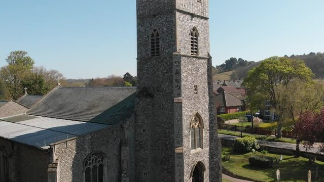 Aerial drone footage rising over a church