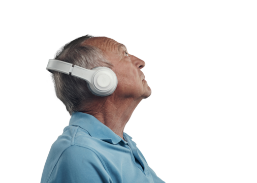 PNG Shot of an elderly male wearing headphones and listening to music in a studio.