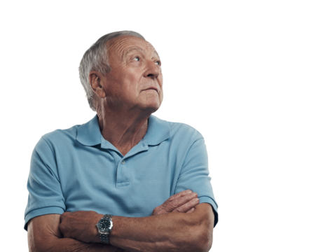PNG Shot of an older man with his arms crossed looking off into the distance in a studio