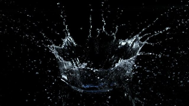 Super Slow Motion Shot of Water Crown Splash Isolated on Black Background at 1000fps.
