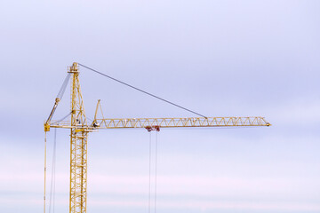 Tower construction crane construction crane. Close up. Copy space. Concept of construction, industry, business