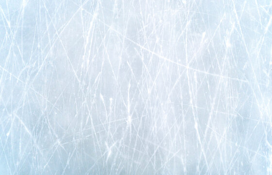Ice texture, top view of scratched snowy ice of the rink