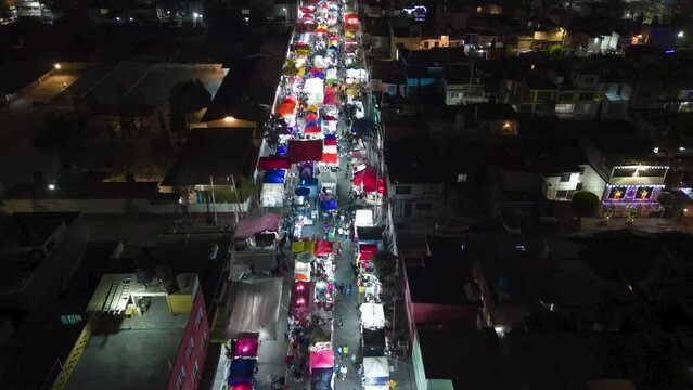 Colorful food and drink stalls at mexico city christmas market, hyperlapse 4k night