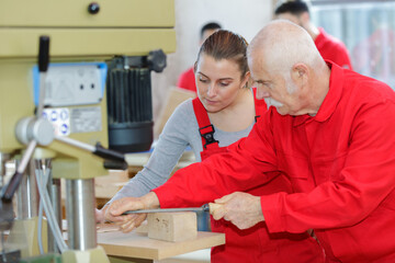 manual sanding a pieces of wood