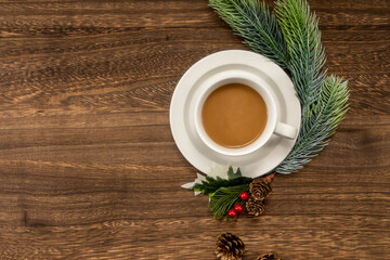 Fototapeta na wymiar Christmas decorations and coffee on wooden background. christmas concept.