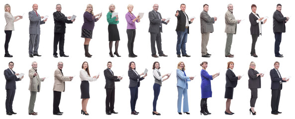 Obraz premium group of people demonstrating tablet looking at camera