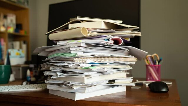 Stop motion of paperworks stacking on a table