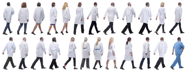 group of doctors in motion isolated on white