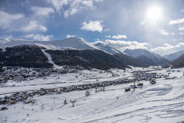 Fototapeta premium Town of Livigno in winter. Livigno landscapes in Lombardy, Italy, located in the Italian Alps, near the Swiss border.