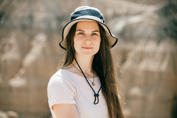woman in the desert, mountain, eyes the color of the sea, Canyon