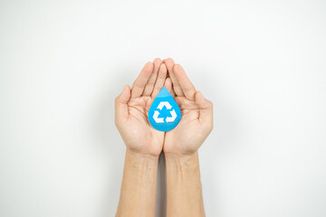 Hands holding water drop paper cut, Washing hand, Hand sanitizer and Hygiene for covid pandemic. World water day, Save water, Renewable energy concept.