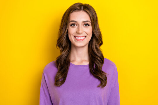 Photo of young satisfied smiling cute woman wear purple jumper toothy beaming smiling after dentistry isolated on bright yellow color background