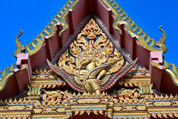art on archway in buddhist temple Wat Mai Hat Krating Thong, Chonburi Province, Thailand