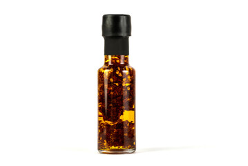 bottle of spyci oil with carolina reaper, habanero , chipotle . 