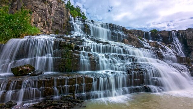 Time lapse of mystical waterfall in the Da Lat plateau, Vietnam. This is known as the first Southeast Asian waterfall in the wild beauty attracted many tourists to visit