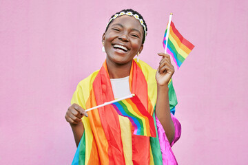 Pride, lgbtq and black woman with flag, rainbow and advocate for lgbt rights and queer community...