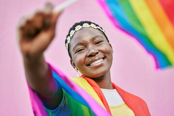 LGBT, pride and portrait of black woman with rainbow flag for self love, individuality and support for the LGBTQ community. Equality, human rights and face of bisexual, gay or lesbian African girl - obrazy, fototapety, plakaty