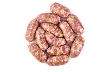 German Oktoberfest Sausages with basil leaf, close-up, isolated on white background.