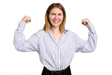 Obraz premium Young caucasian woman isolated showing strength gesture with arms, symbol of feminine power