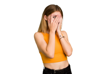 Young caucasian woman isolated blink through fingers frightened and nervous.