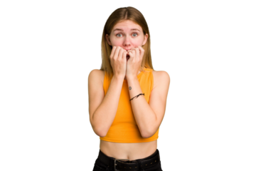 Young caucasian woman isolated biting fingernails, nervous and very anxious.