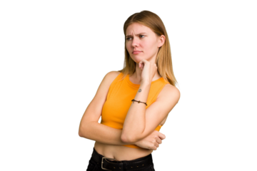 Young caucasian woman isolated confused, feels doubtful and unsure.