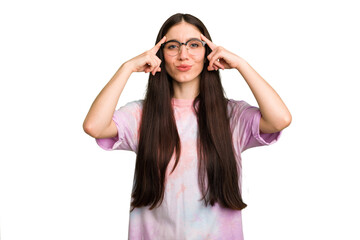 Young caucasian brunette long hair woman cutout isolated focused on a task, keeping forefingers pointing head.